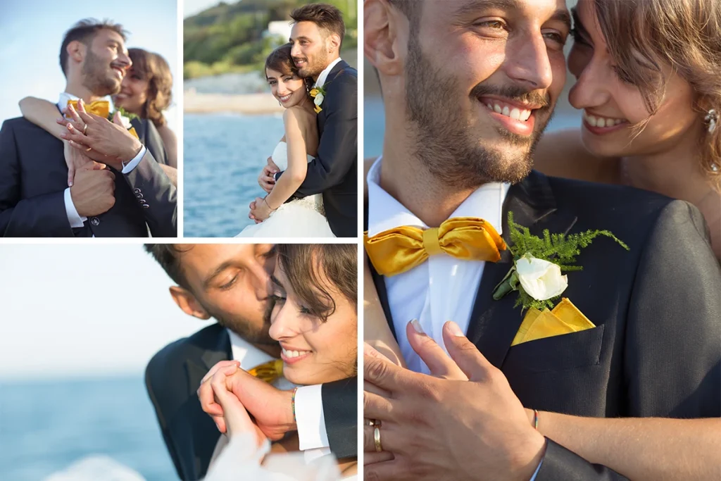 foto di matrimonio con una coppia di sposi che si abbraccia al mare sugli scogli a San Vito